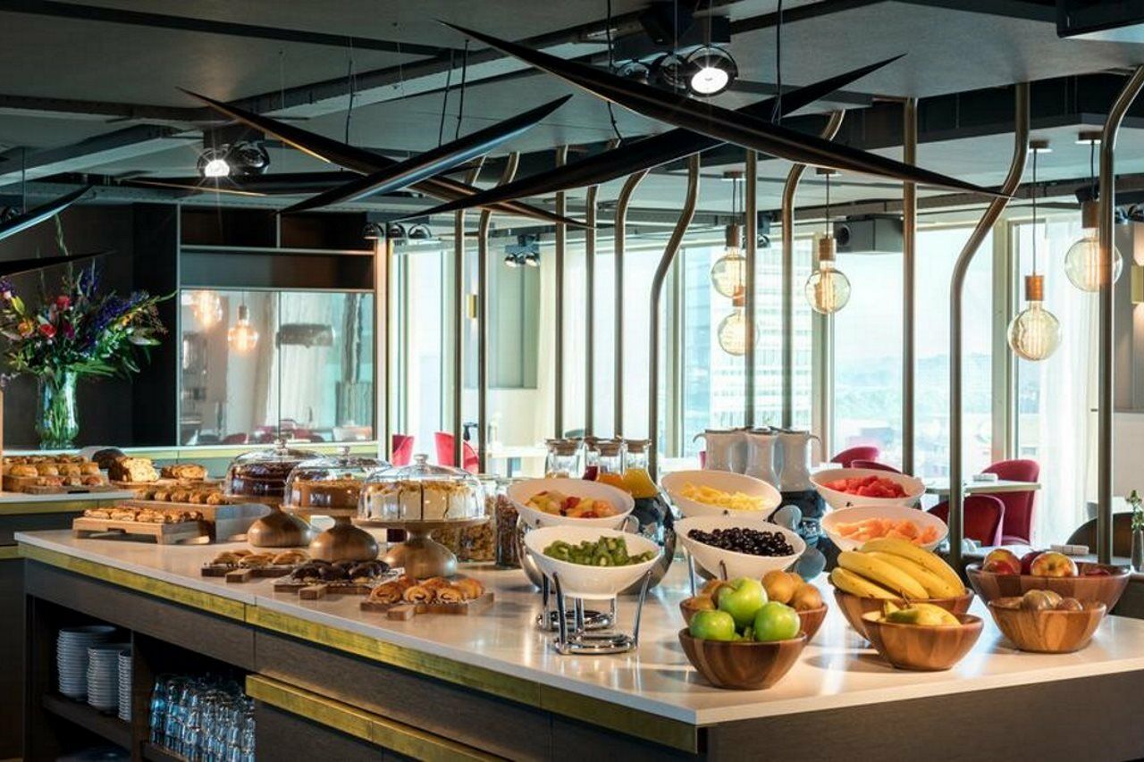 Nh Collection Eindhoven Centre Hotel Buitenkant foto The buffet at the lounge